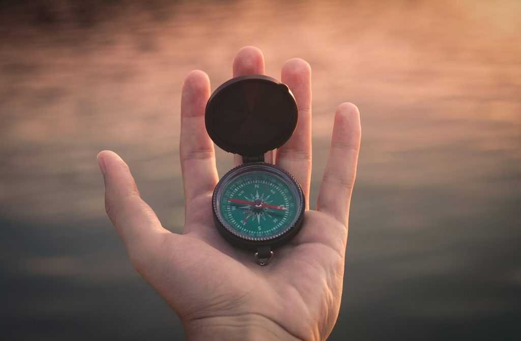 A compass belongs on a beginner hiking gear checklist